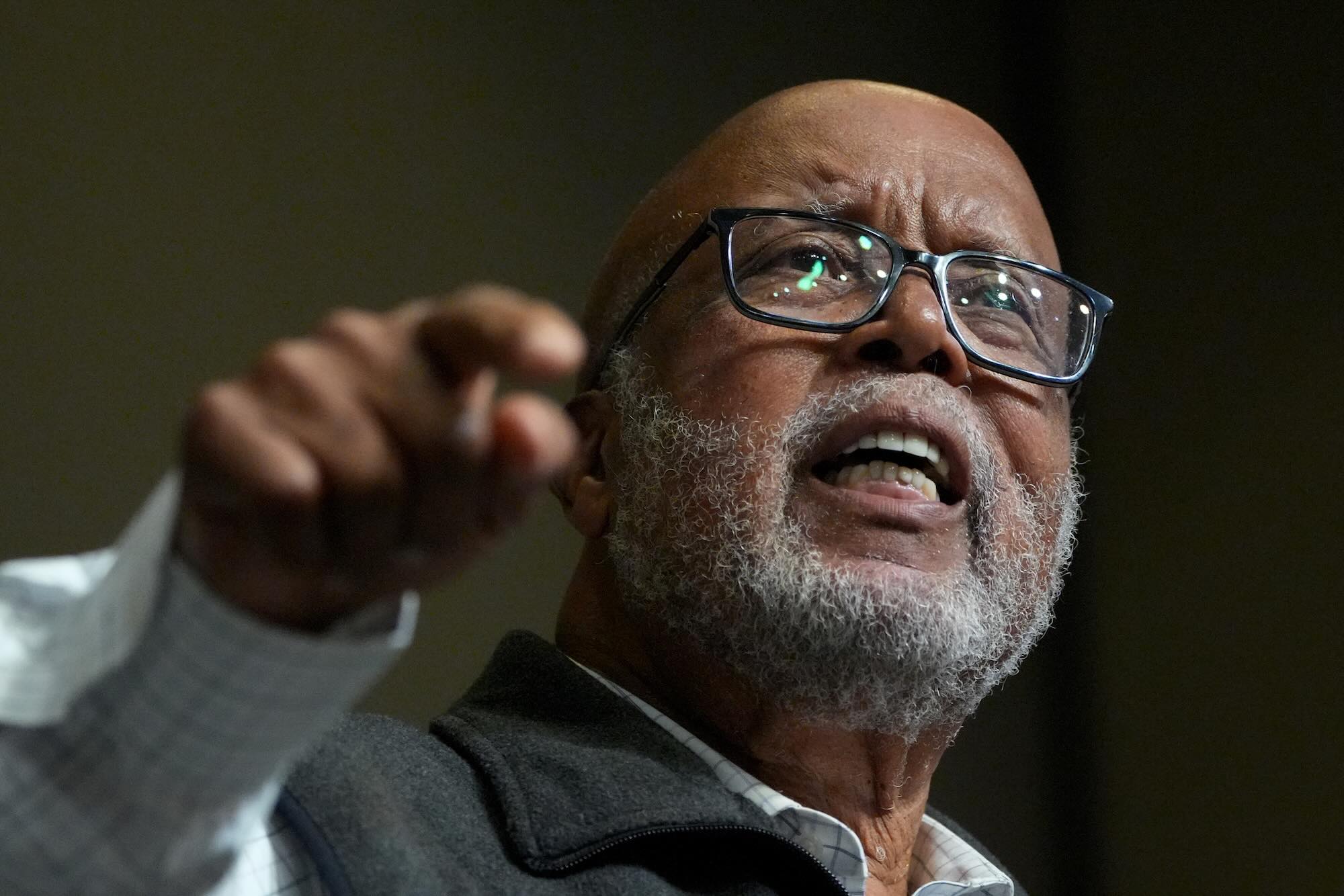A closeup of Bennie Thompson, one hand pointing as he speaks