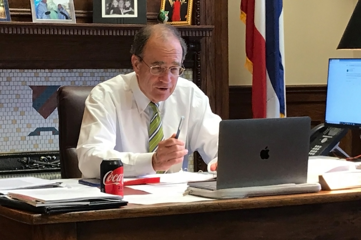 Delbert Hosemann sitting at his desk