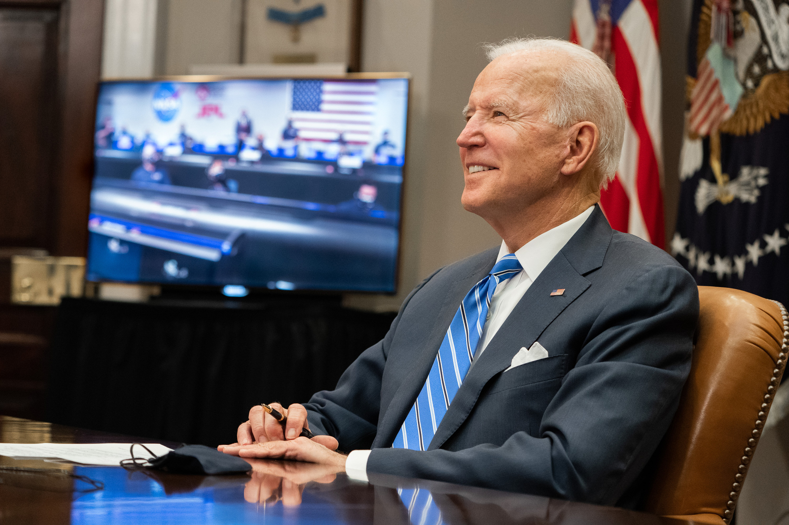 President Joe Biden participating in a virtual phone conference