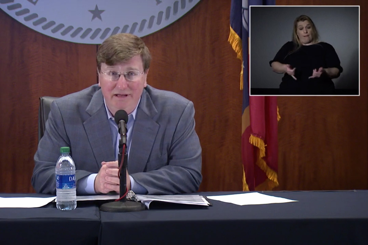 Tate Reeves speaking at mic