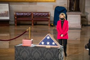 Cindy Hyde-Smith stands in the Capitol rotunda during a memorial for Brian Sicknick