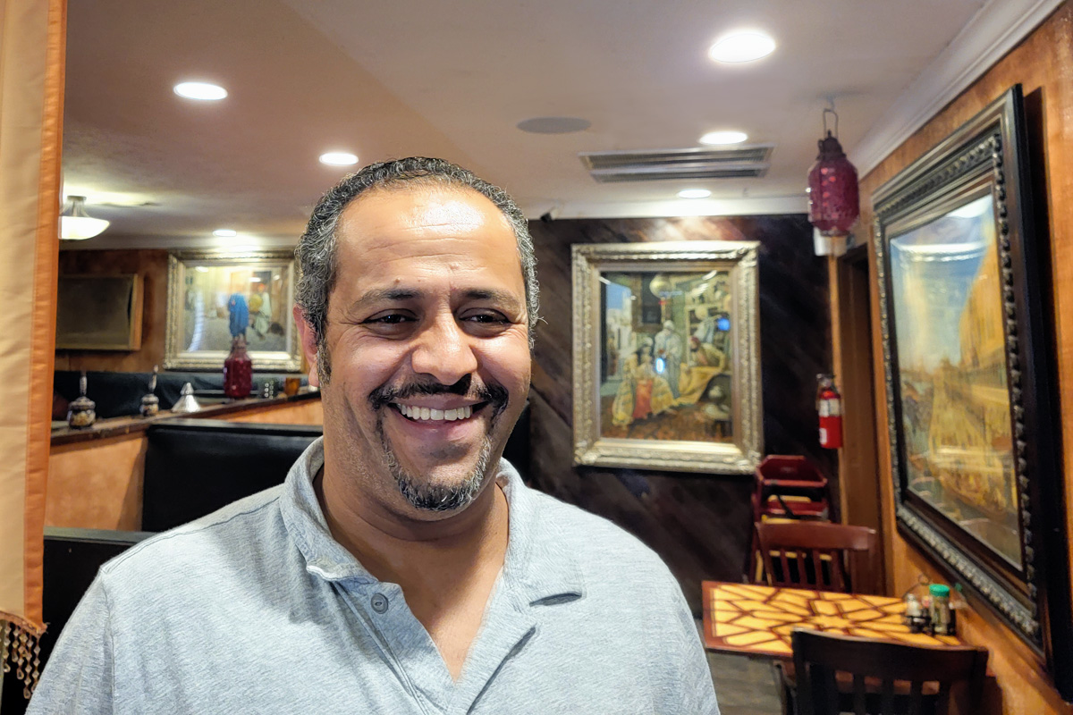 Yoseph Ali inside his restaurant, Aladdin Mediterranean Grill