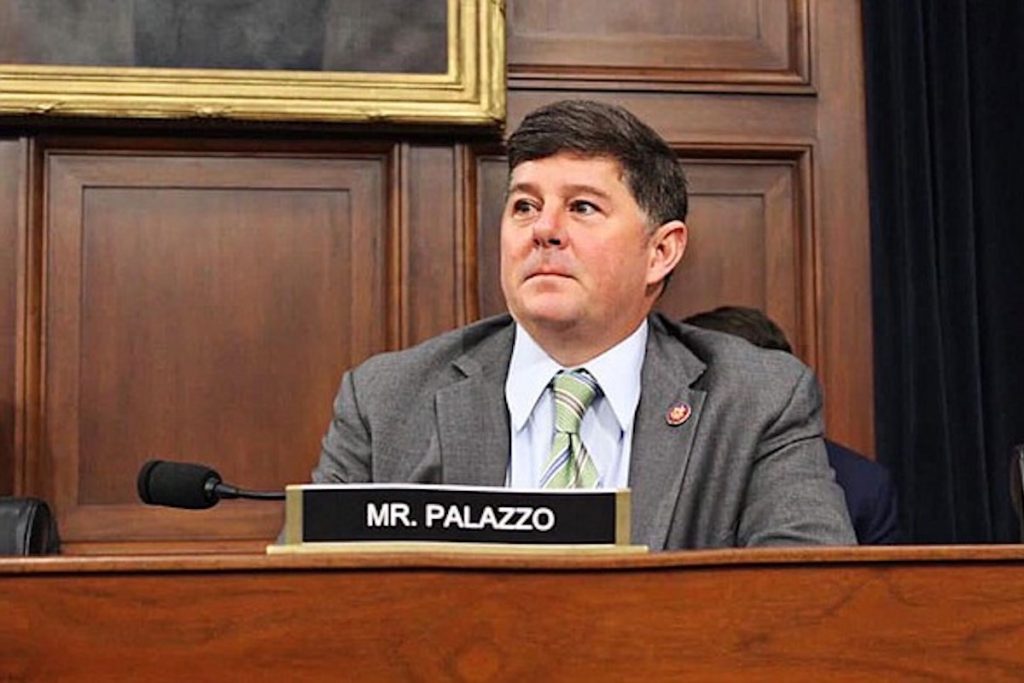 Steven Palazzo sits at a committee hearing