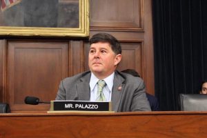 Representative Steven Palazzo sits at a desk in a House committee hearing