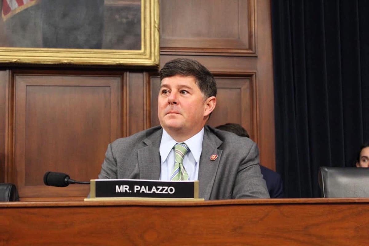 Representative Steven Palazzo sits at a desk in a House committee hearing
