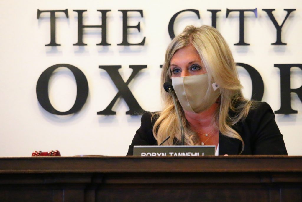 Robyn Tannehill, masked, at Oxford meeting