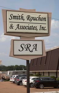 Sign that reads Smith, Rouchon & Associates, Inc.