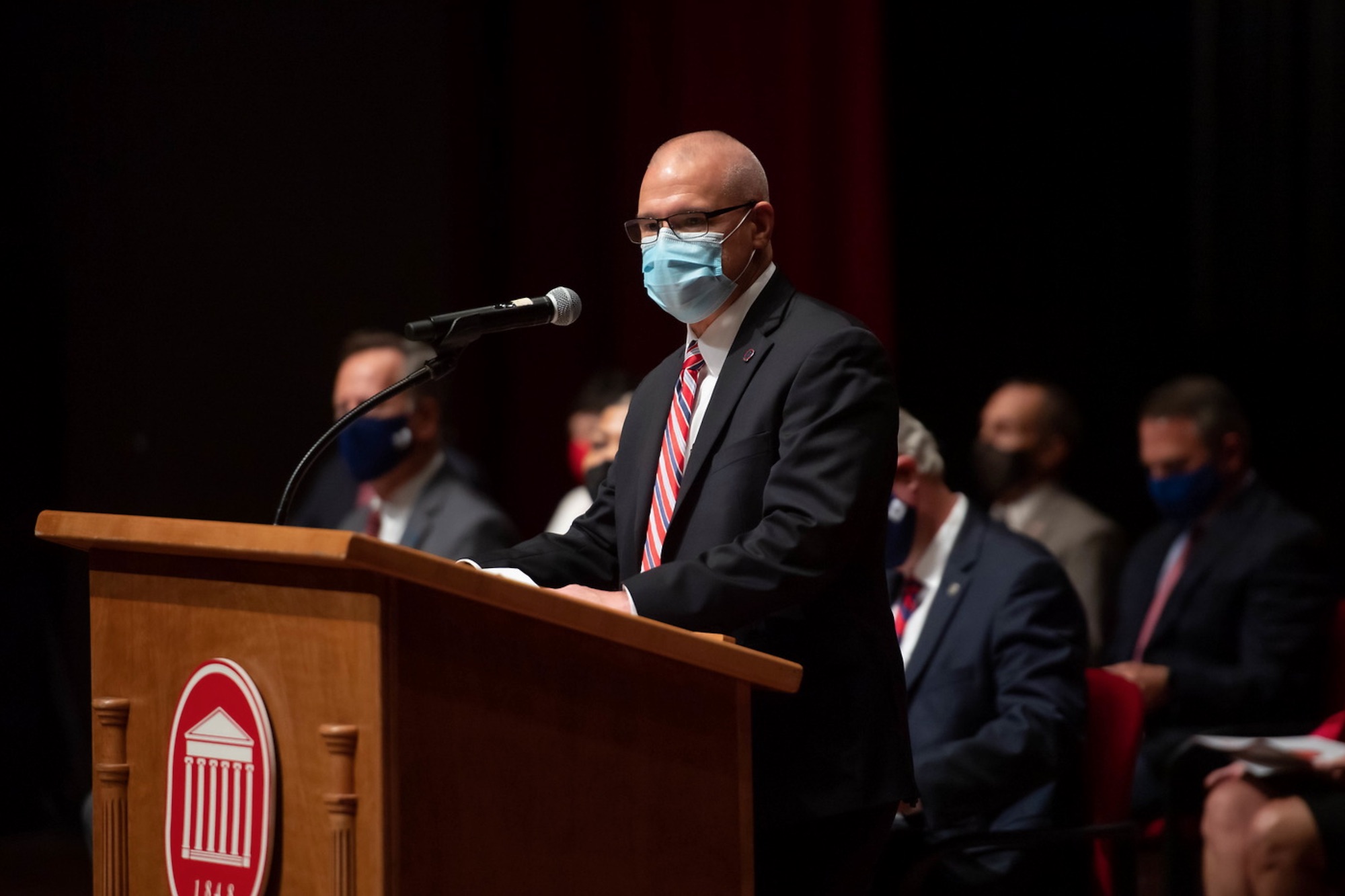 a photo of Noel Wilkin speaking at the August 27 2021 fall faculty meeting