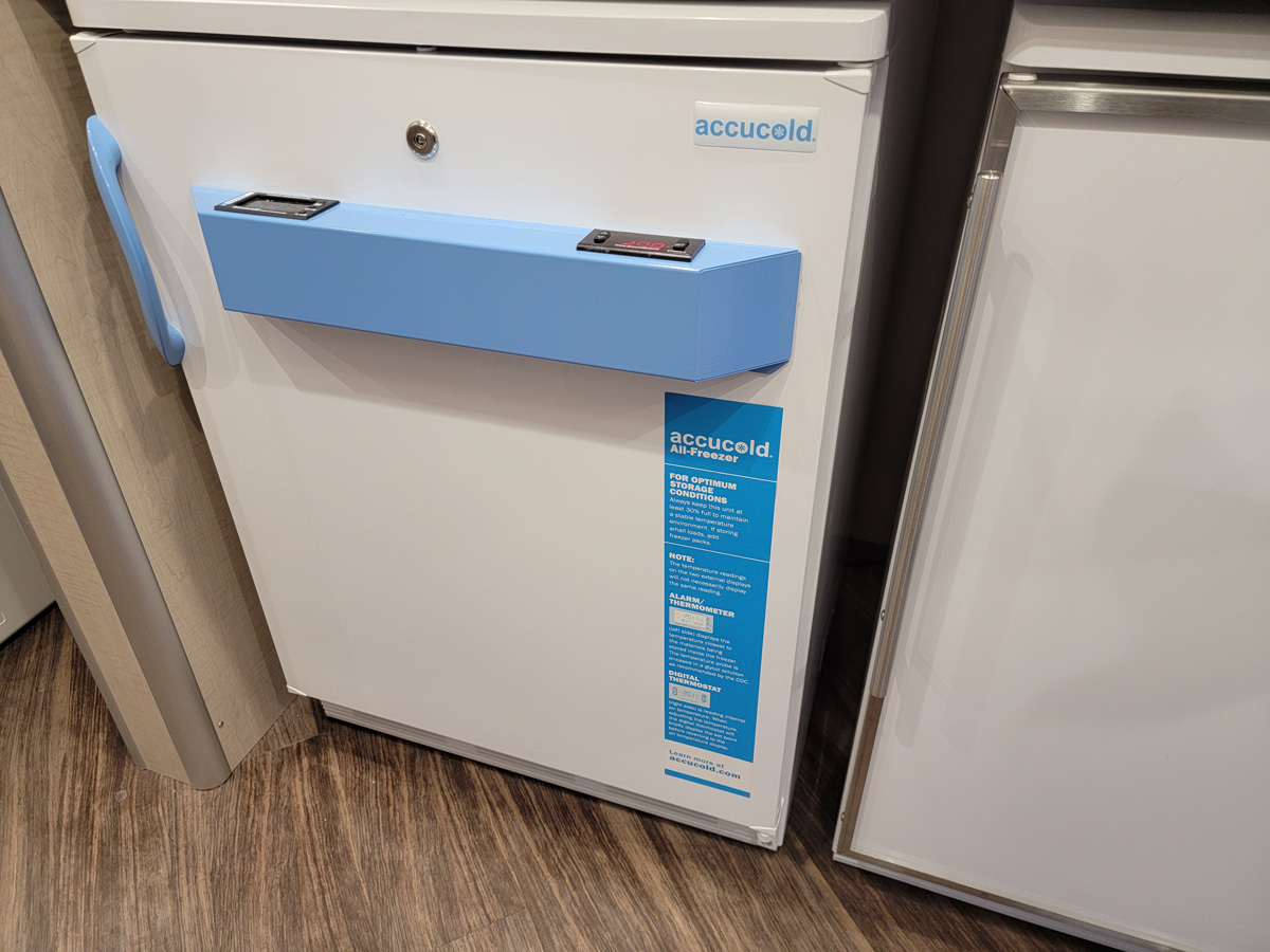 Accucold freezer for holding COVID-19 vaccine bottles