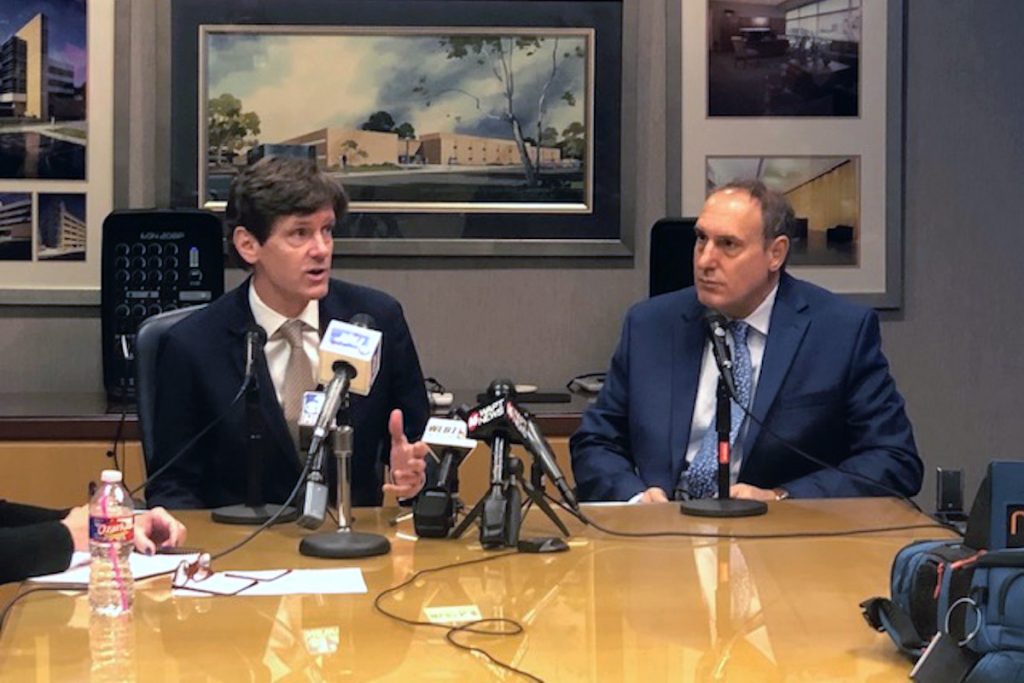 Mississippi State Epidemiologist Dr. Paul Byers, seen on right at a MSDH press conference on COVID-19 with State Health Officer Dr. Thomas Dobbs speaking at a press conference