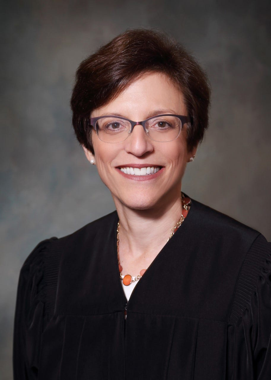 Judge Judith Levy in black robes