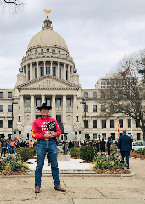 anti-abortion preacher Alan Hoyle stands outside the Mississippi Capitol Building