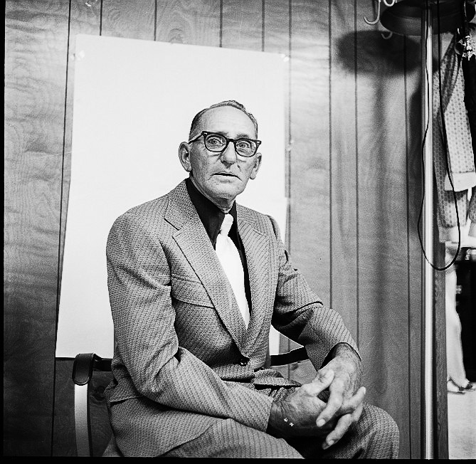 Wallace Flurry in front of Parham’s makeshift portrait setup in the Amory Advertiser office in 1975. Photo by Bonny Parham / courtesy Amory Regional Museum