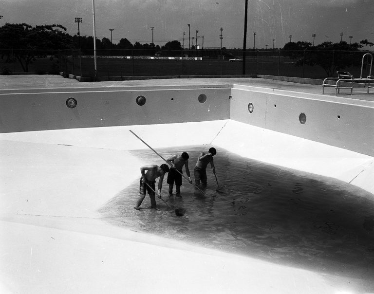Amory Parks and Recreation Department employees clean the town pool in June 1967. Photo by Bonny Parham / courtesy Amory Regional Museum