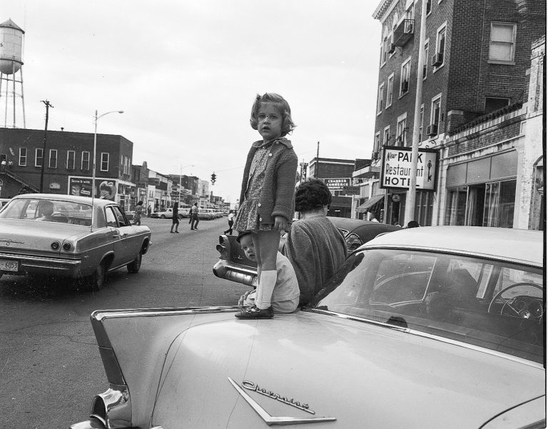 A girl watches the Amory High School Homecoming Preview in October 1966. Photo by Bonny Parham / courtesy Amory Regional Museum