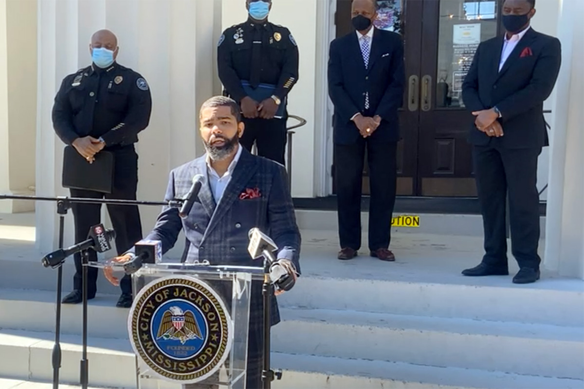 City of Jackson Mayor Chokwe talking at a podium outside of City Hall