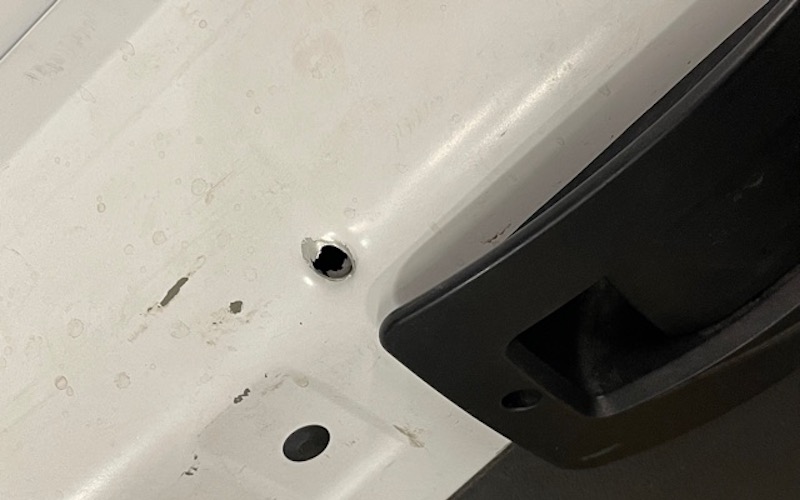 Holes in the side of D'Monterrio Gibson's fedex delivery vehicle