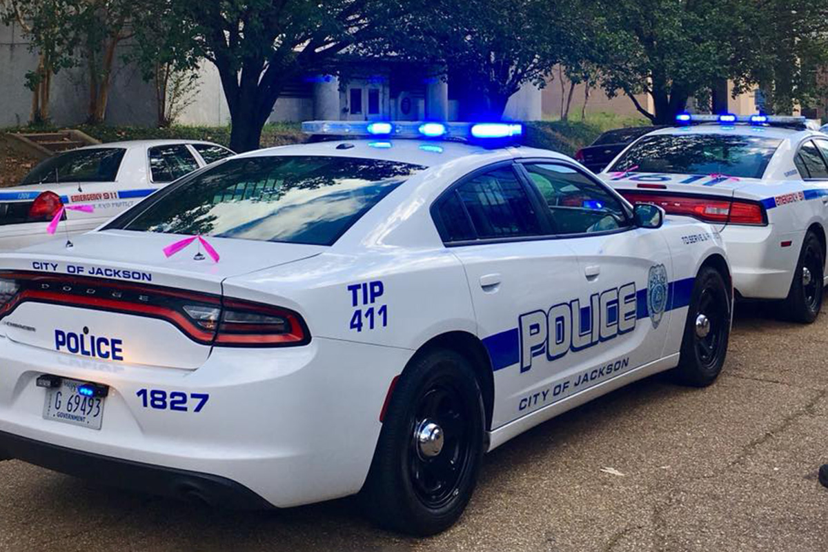Police cars that say Police City of Jackson