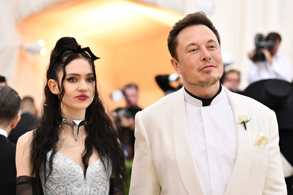 Grimes and Elon Musk dressed all in white at the Met