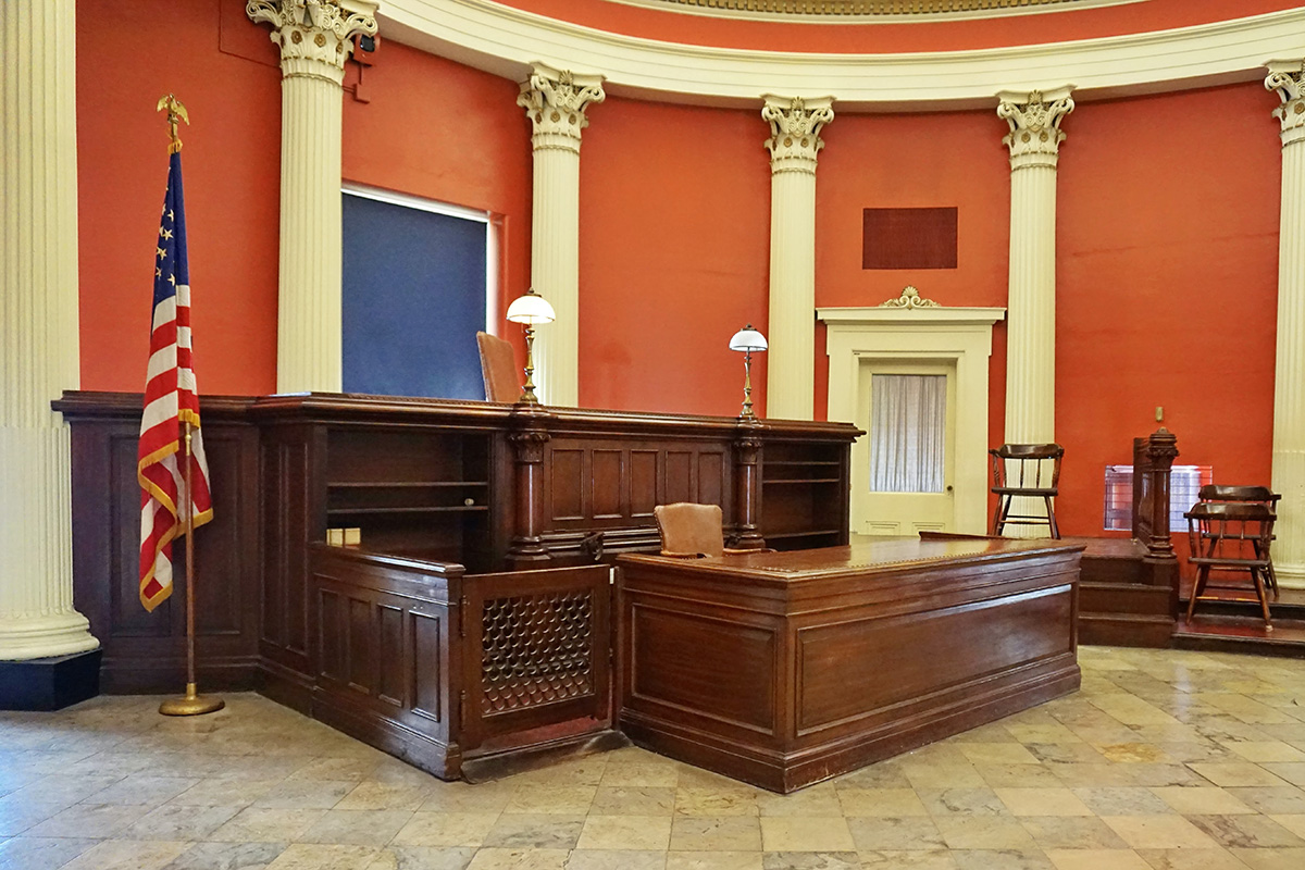 Inside view of a courtroom with orange walls