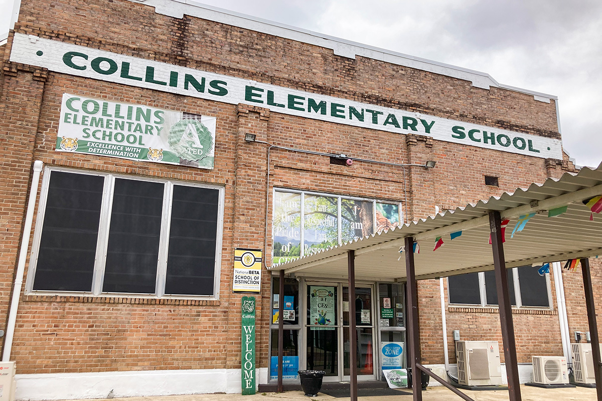 An exterior view of the brick face of Collins Elementary School