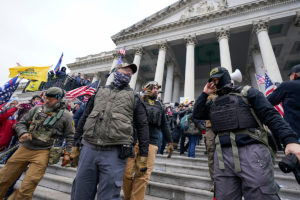 Members of the Oath Keepers stand outside the U.S. Capitol