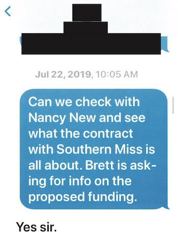 screenshot of text message between Phil Bryant and staff attorney