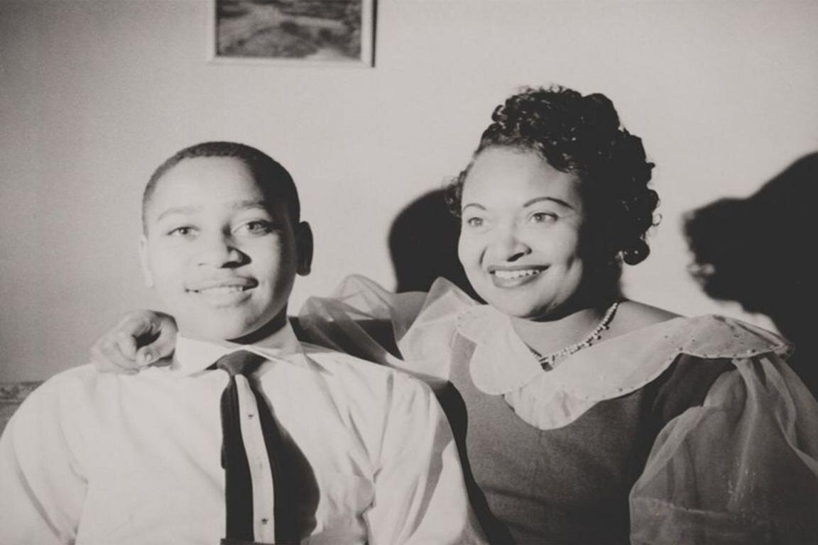 Black and white photo of young Emmett Till and his mother