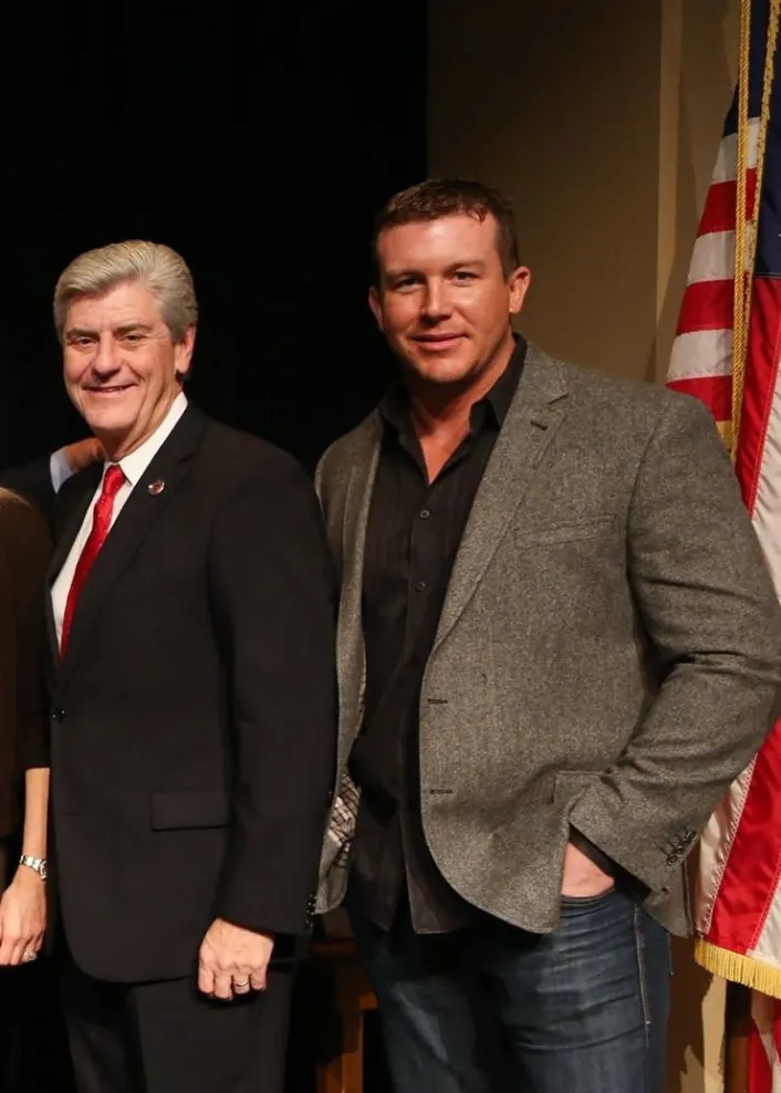 a photo of Phil Bryant and Teddy DiBiase Jr.