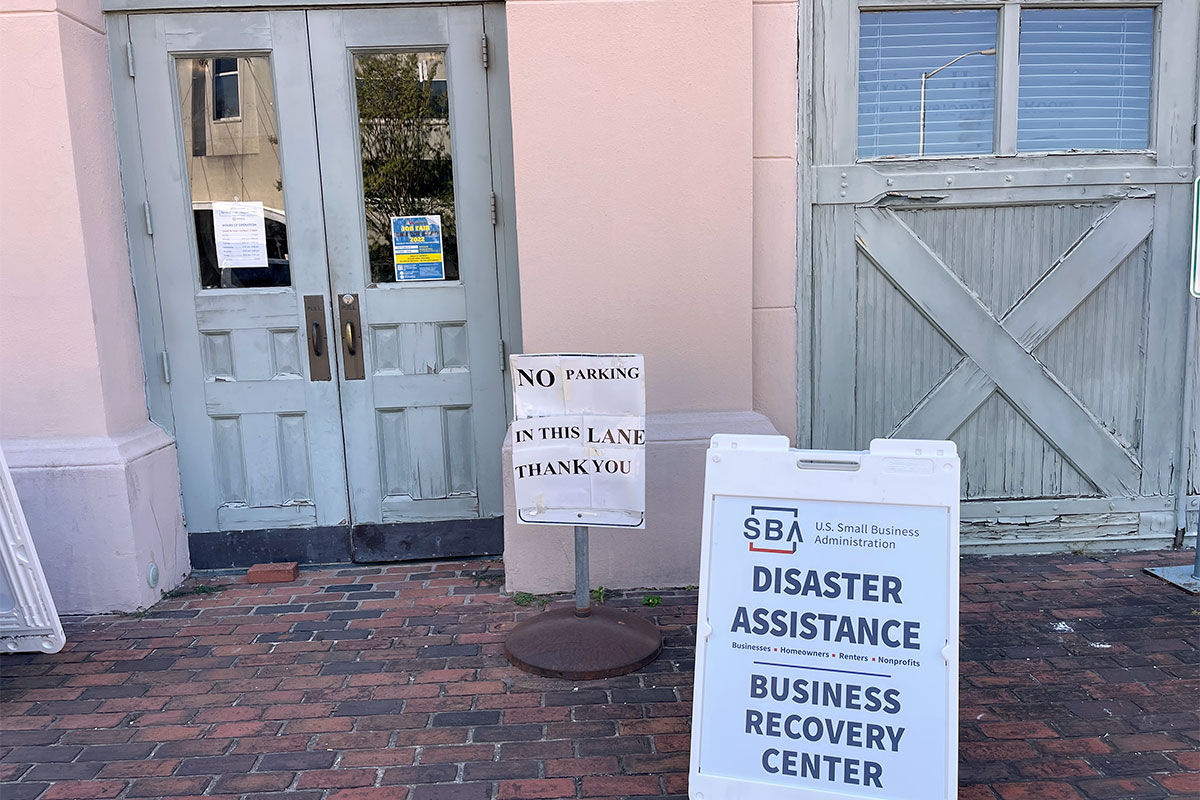 An outside entrance with a sign that reads SBA Disaster Assistance Business Recovery Center