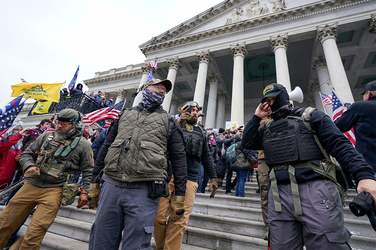 Members of the Oath Keepers stand in front of the U.S. Capitol on Jan. 6, 2021.