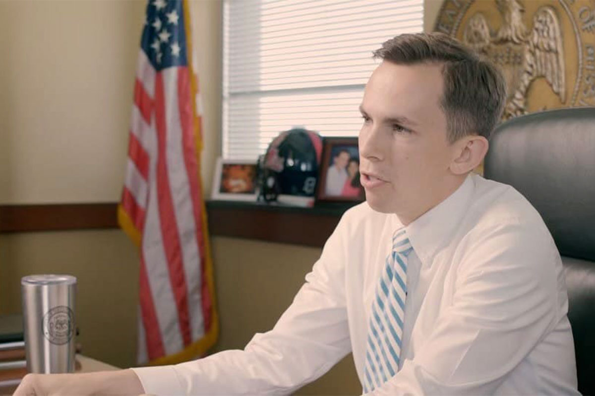 Mississippi State Auditor Shad White seated at his desk
