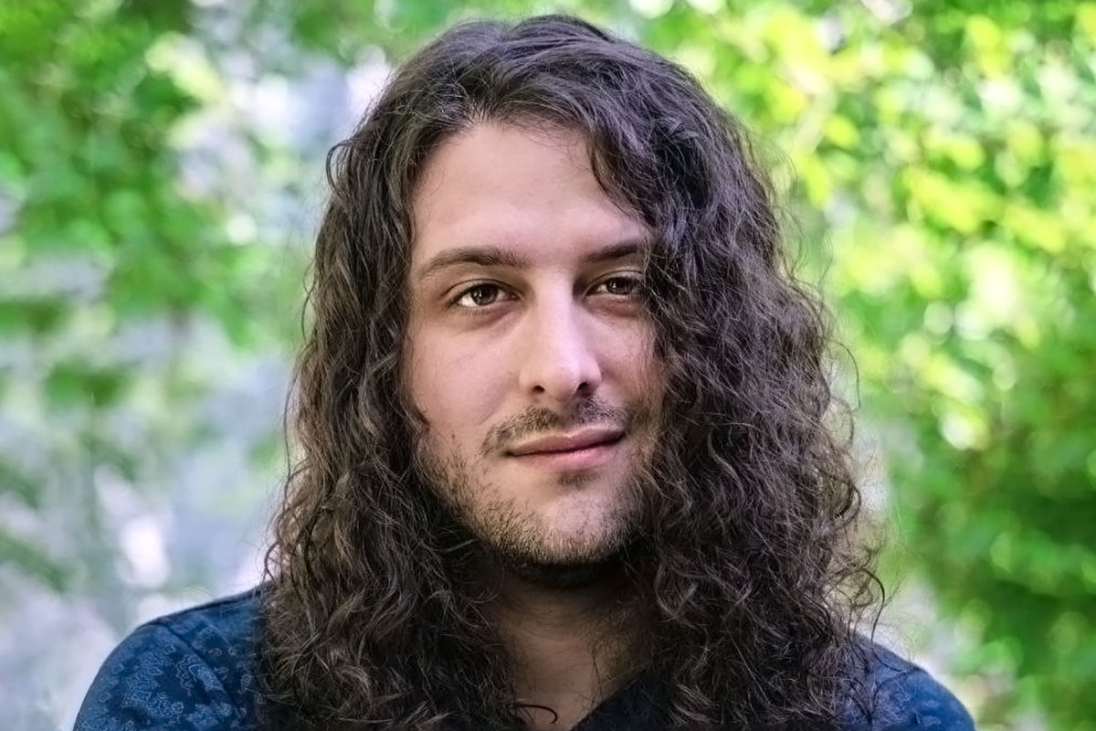 Headshot of reporter Nick Judin