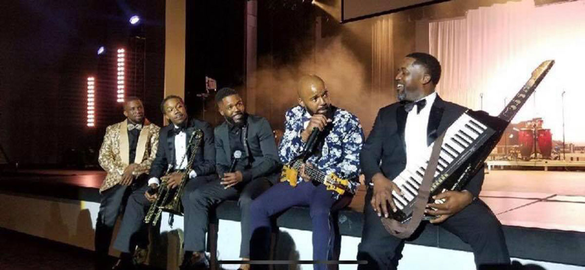 From left: Leon Jones, D’Andre Thigpen, Dathan Thigpen, Dominic Thigpen and Donavon Thigpen perform a Bruno Mars song at Donavon's 40th birthday party. (performing arts)