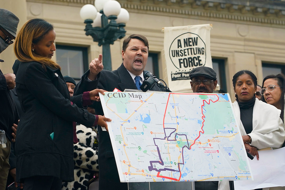 Cliff Johnson, center, with the MacArthur Justice Center, voices his opposition to Mississippi House Bill 1020, Tuesday, Jan. 31, 2023, during a protest at the Mississippi Capitol in Jackson. The bill would create a separate court system in the Capitol Complex Improvement District in Jackson. Now the Legislature is backing away from the courts plan.