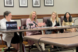 Bridge Forensic Services Operations Manager Beth McCord, Center for Violence Prevention Executive Director Sandy Middleton, Mississippi State Rep. Dana McLean, and Mississippi Sen. Angela Burks Hill sitting at a table