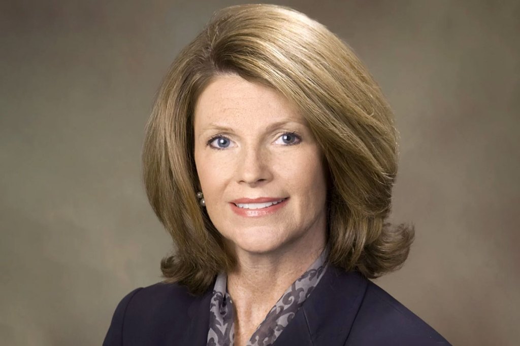 Official headshot of Mississippi Parents’ Campaign Executive Director Nancy Loome in a dark suit top
