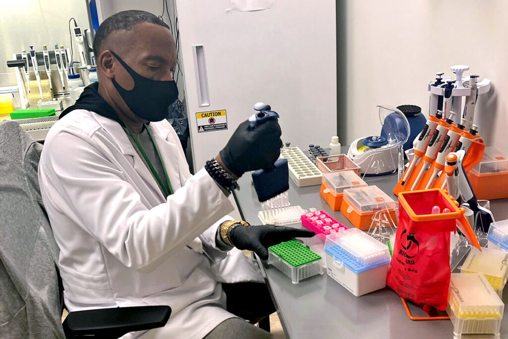 Dr. Christian Rogers extracts cannabis samples to test and analyze microorganisms