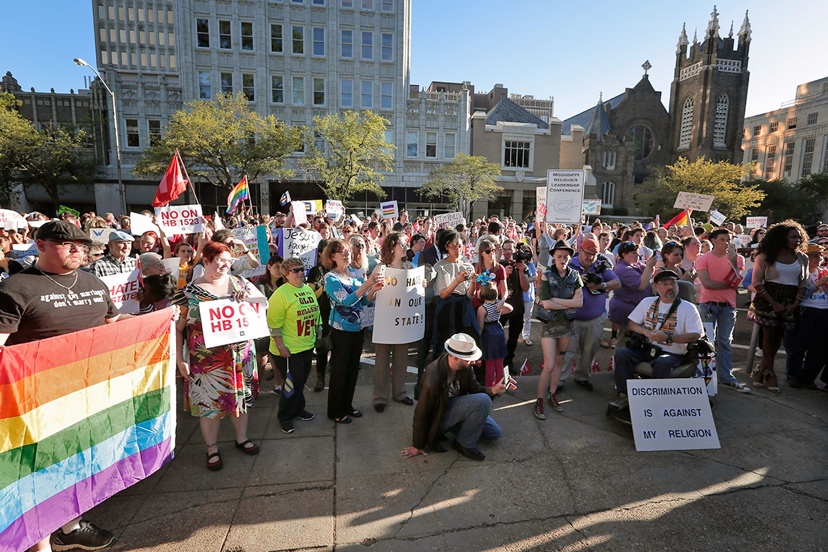 A crowd rallies against LGBTQ hate