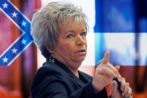 Sen. Kathy Chism, R-New Albany, speaks during debate, overlaying the Mississippi flag of 1894
