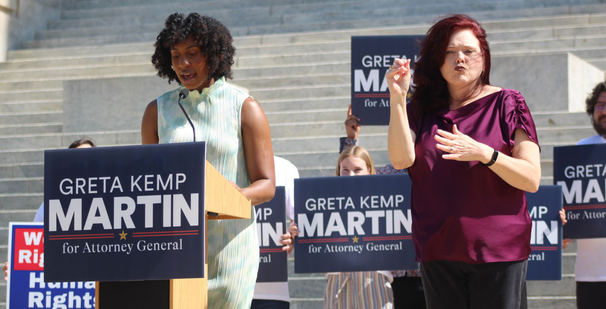 Tyler Harden speaking at a Greta Kemp Martin for Attorney General event