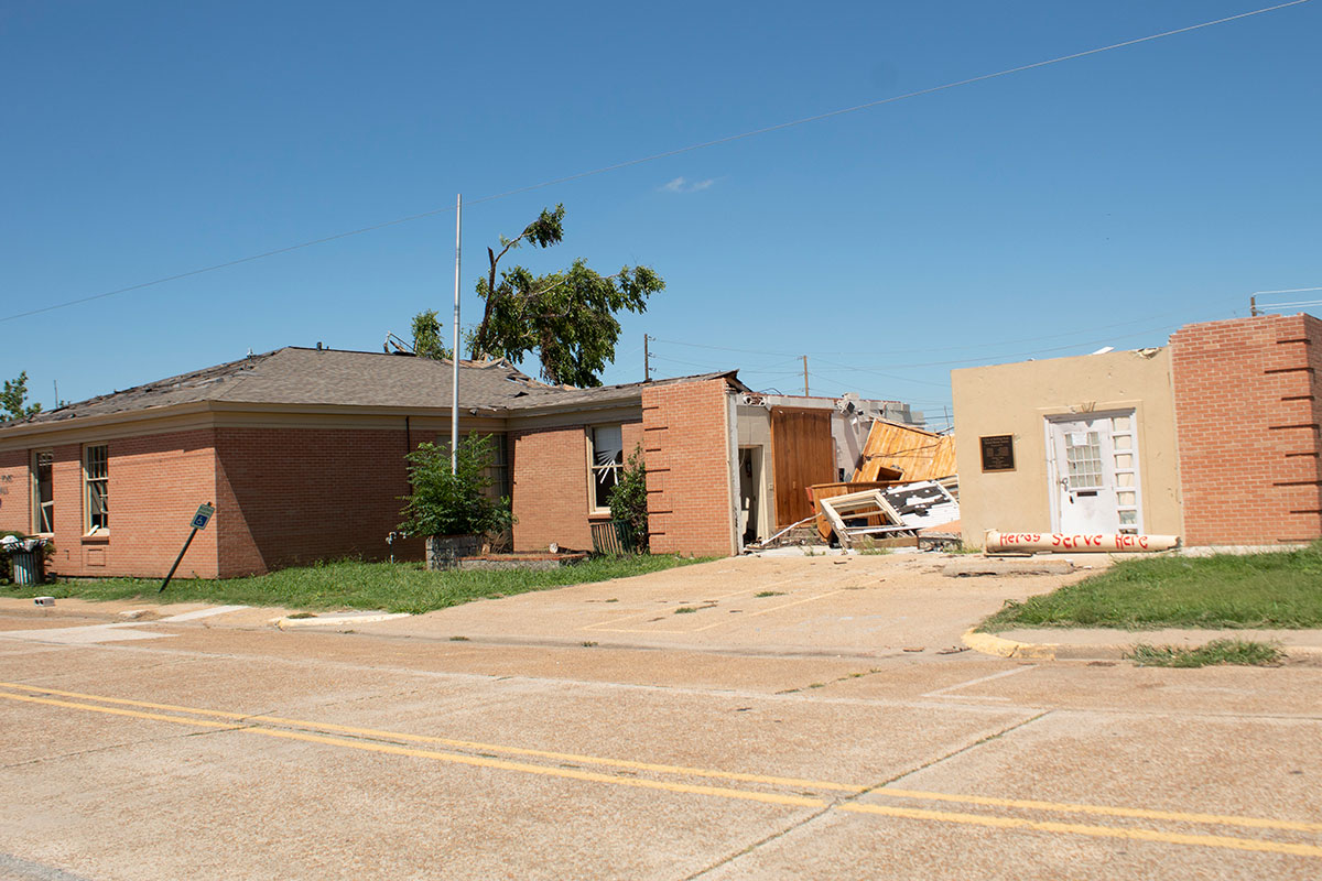 The City Hall of Rolling Fork seen with roof and some walls missing from storm damage