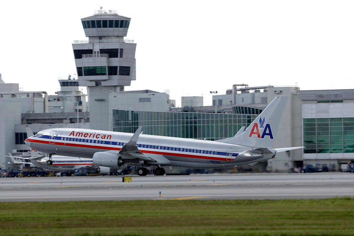 An airplane emblazoned with the old American Airlines branding at an airport