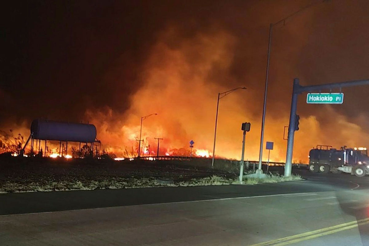 Fires seen at night past Hokiokio Pl
