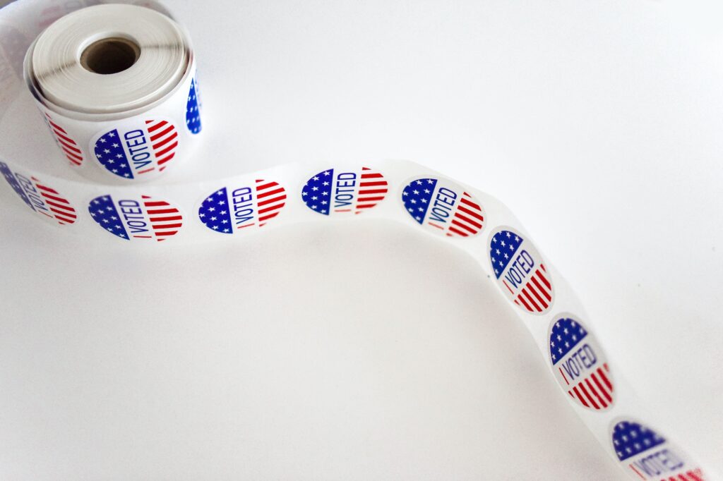 a photo of a roll of I VOTED stickers