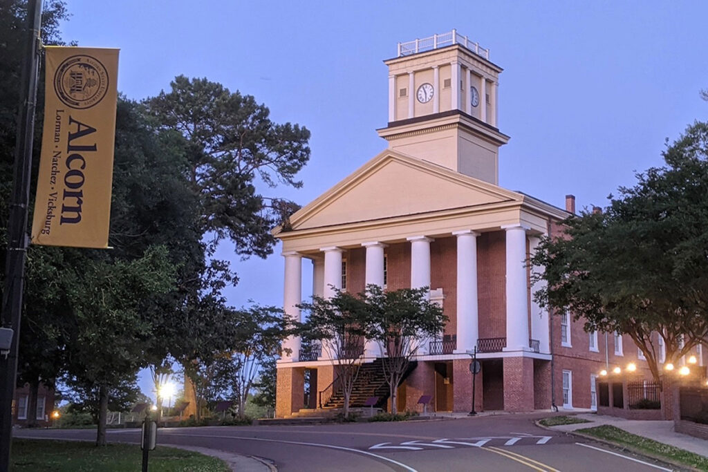 An exterior view of a columned building on Alcorn State University's campus