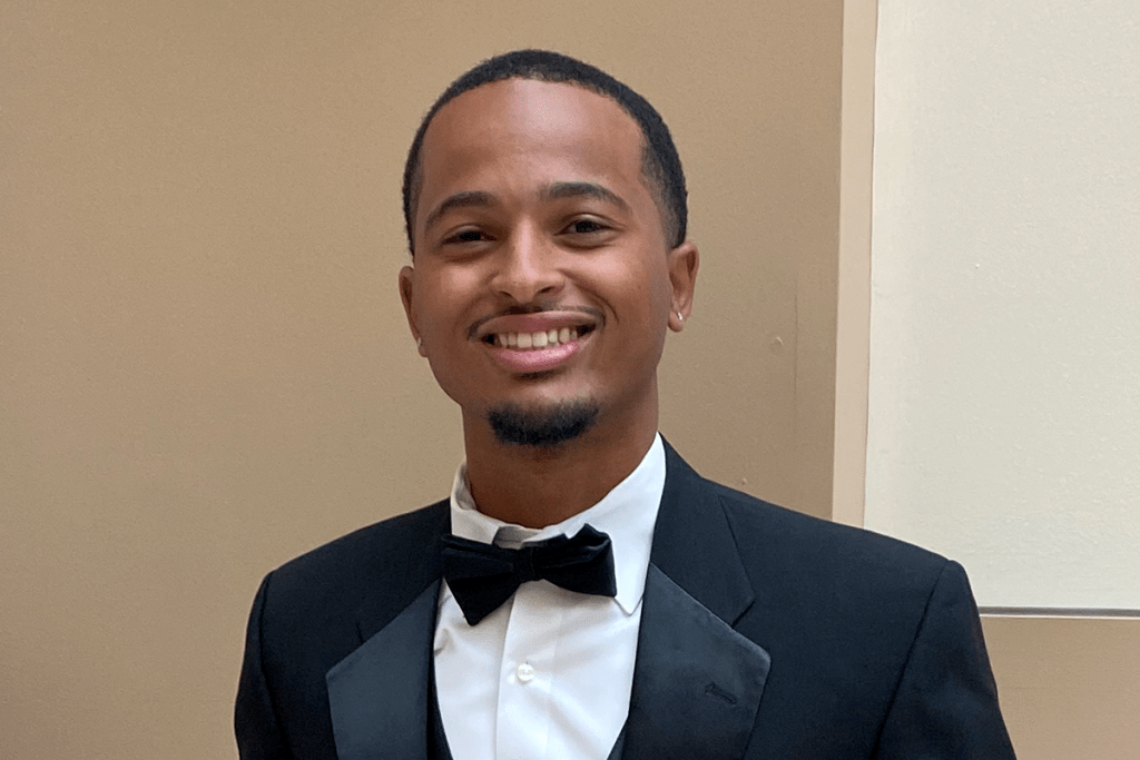 Jaylen Burns dressed in a tuxedo