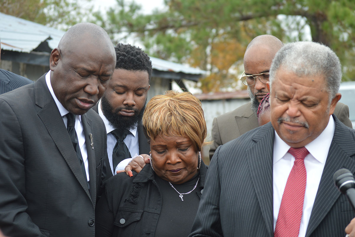 The Wade family prays at a vigil