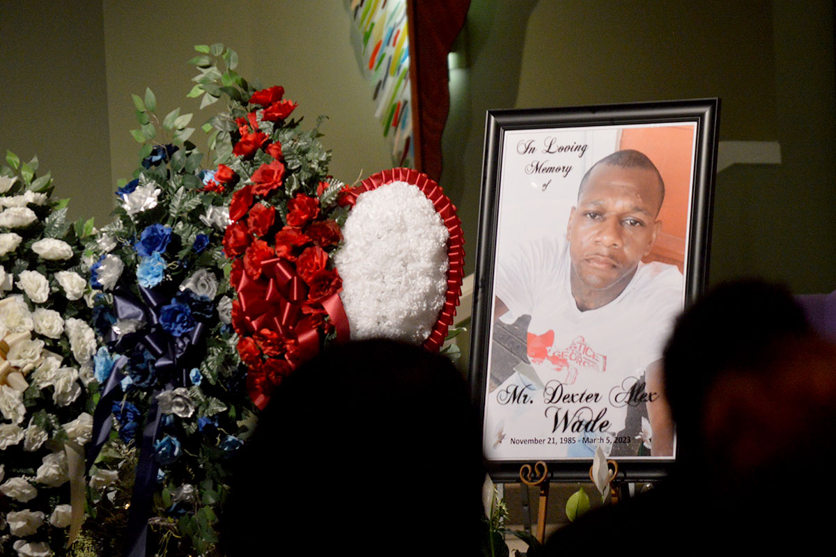 Dexter Wade photo poster at funeral