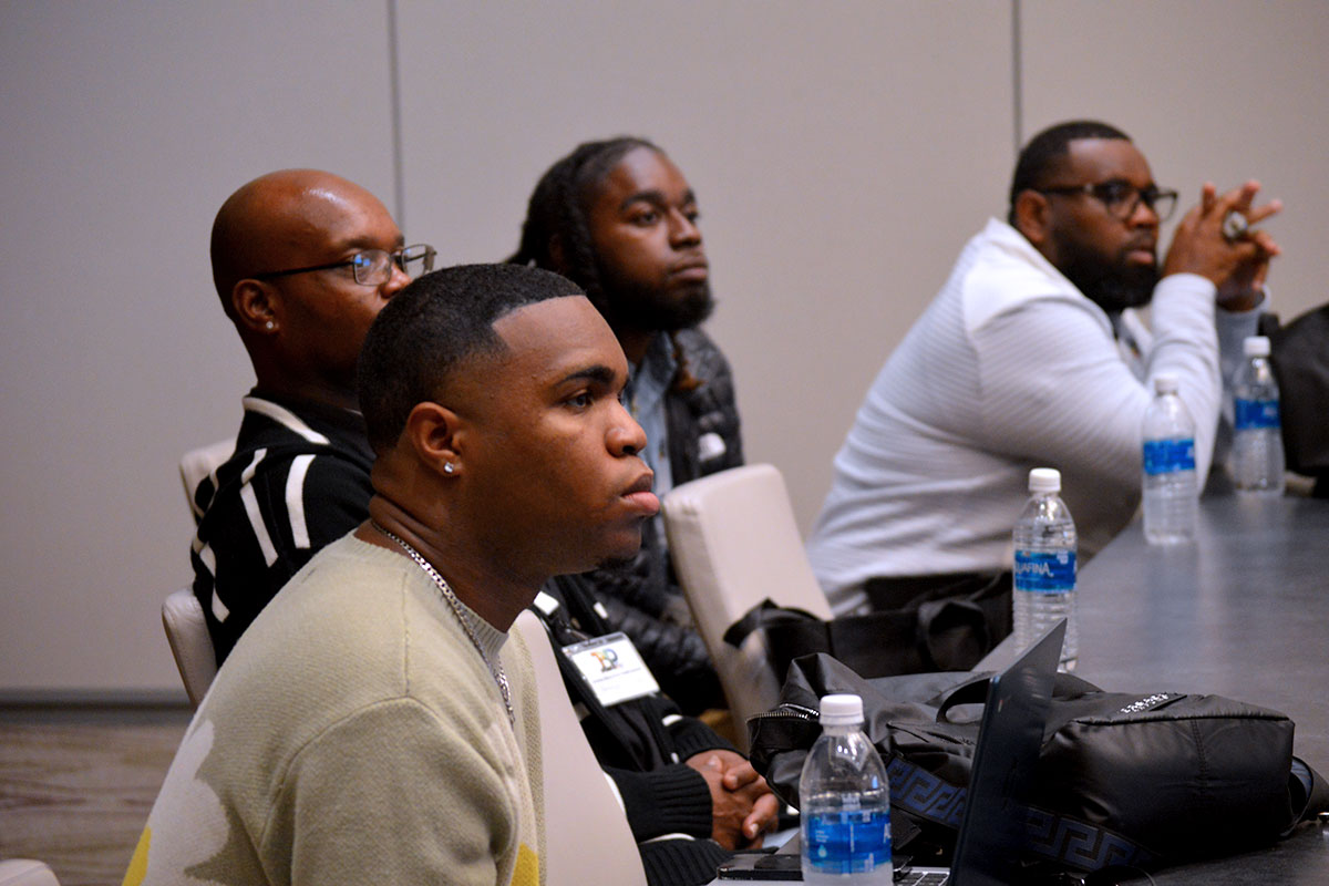 The audience listening at the Jackson Black Pride health symposium.